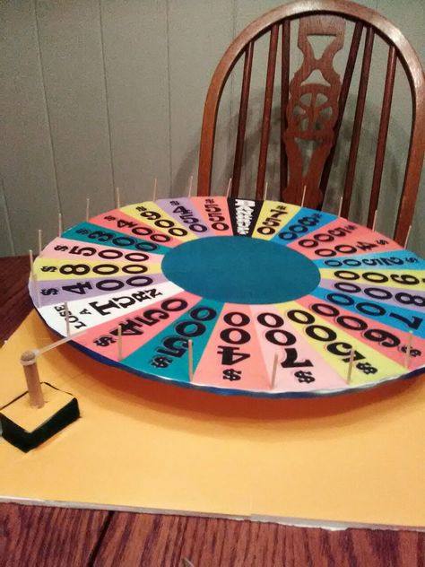 Homemade foam board Wheel of Fortune Wheel Of Fortune Game, Board Game Themes, 007 Casino Royale, Homemade Board Games, Nursing Home Activities, Family Feud Game, Game Night Parties, Board Games Diy, Casino Night Party