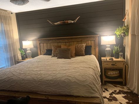 Black shiplap. Master bedroom. DIY king bed. DIY nightstands. Bedroom With Black Shiplap Wall, Western Bedroom With Accent Wall, Black And White Shiplap Bedroom, Modern Farmhouse Nightstand Diy, Western Bedroom With Black Accent Wall, Rustic Shiplap Wall Bedroom, Black Shiplap Headboard, Western Room Accent Wall, Black Shiplap Bedroom Wall