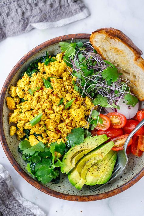 A vegan version of scrambled eggs, this Tofu Scramble recipe is so delicious! Load it up with seasonal veggies that you already have on hand, or keep it plain and simple- either way, you'll love this high-protein vegan breakfast. Make it in 15 minutes! High Protein Savoury Breakfast, Vegan High Protein Breakfast, Protein Vegan Breakfast, Tofu Scramble Recipe, High Protein Vegan Breakfast, Savoury Breakfast, Tofu Scramble Vegan, Whole30 Vegan, Scrambled Tofu Recipe