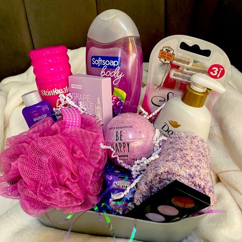 Lovely Gift For Mom Daughter Sister Aunt Wife Friend. Perfect For Mothers Day / Birthday / Any Occasion Included: Revlon Eye Shadow Palette / Fuzzy Socks Dove Probiotic Aa Hand Wash 12 Ounce Aussie Travel Conditioner / Be Happy Bath Bomb Skintimate Raspberry Shave Gel / Bic 3 Count Razors Soft Soap Body Wash Blackberry 20 Oz / Pink Poof Fun Purple Pens 5 Count / Pretty Purple Candle Period Basket For Daughter, Self Care Basket Ideas Diy Gifts, Mother’s Day Gifts Baskets, New Mother Gift Basket, Hygiene Basket, Pink Basket Gift Ideas, Self Care Baskets, Soft Soap Body Wash, Cute Birthday Baskets