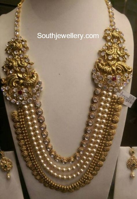 22 carat gold antique layered kasu haram adorned with south sea pearls, polki diamonds and rubies. Kandoli Designs Gold, Pearl Haram Design, 20grams Gold Necklace Designs, Gold And Pearl Necklace, Kasu Mala, Mala Jewelry, Perhiasan India, Antique Gold Jewelry Indian, Art Necklace