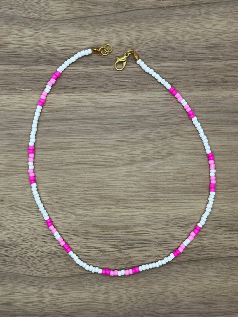 This is one of our shop's signature necklaces! I hope you love this as much as I do! Winter Seed Bead Necklace, Beaded Bracelets And Necklaces, Seed Bead Necklaces Ideas, Jewelry Design Beads, Pink Seed Bead Necklace, Seed Bead Necklace Ideas, Bead Necklace Ideas, Beaded Necklace Ideas, Seed Bead Necklaces