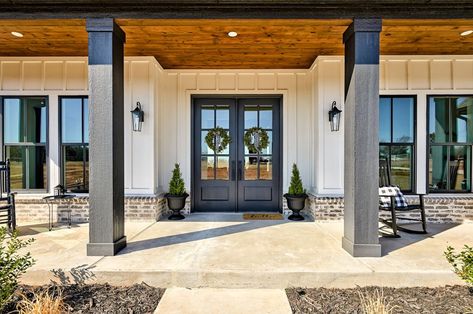 Black Beams Front Porch, Gray Columns Front Porch, Black Stained Porch Columns, Natural Wood Pillars Front Porches, Rambler Front Porch, Modern Farmhouse Exterior Front Porch, Homes With A Front Porch, House With Black Columns, Front Porch Wood Pilars