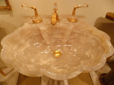 Sherle Wagner sink and fixtures post:  http://courtneyprice.com/sherle-wagner-yes-please/ Bathroom Trolley, Shell Sink, Sherle Wagner, Carved Sink, Quartz Bathroom, Quartz Sink, Gold Faucet, Dream House Rooms, Dream House Interior