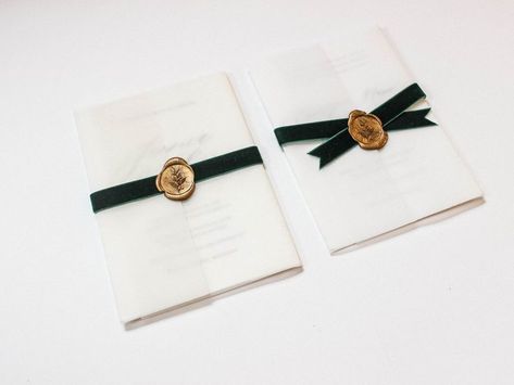 Vellum wrap with dark green velvet ribbon closure options with a gold wax seal Wax Seal On Ribbon, Invitation With Ribbon And Wax Seal, Ribbon Wax Seal Invitation, Velvet Ribbon Wedding Invitation, Ribbon Wax Seal, Gold Wax Seal, Green Velvet Ribbon, Vellum Wrap, Vellum Envelope