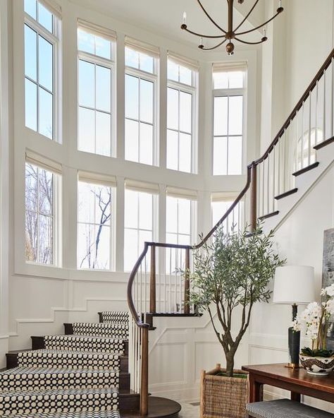 Hatcliff Construction on Instagram: "THE STAIRCASE! If you have been following us for long, you know we love a beautiful staircase. It doesn’t have to be formal! Just always intentional and never forgotten. Here are some of our favorites that we have built over the last few years. Some go up, some go down and some go up and down Builder @hatcliffconstruction Windows @pellawindows Architects and photographers individually tagged on photos. #staircase #staircasedesign #staircases" Staircase With Windows, Staircase Traditional, Carpeted Staircase, Large Staircase, Sweeping Staircase, Georgiana Design, Traditional Homes, The Staircase, Curved Staircase