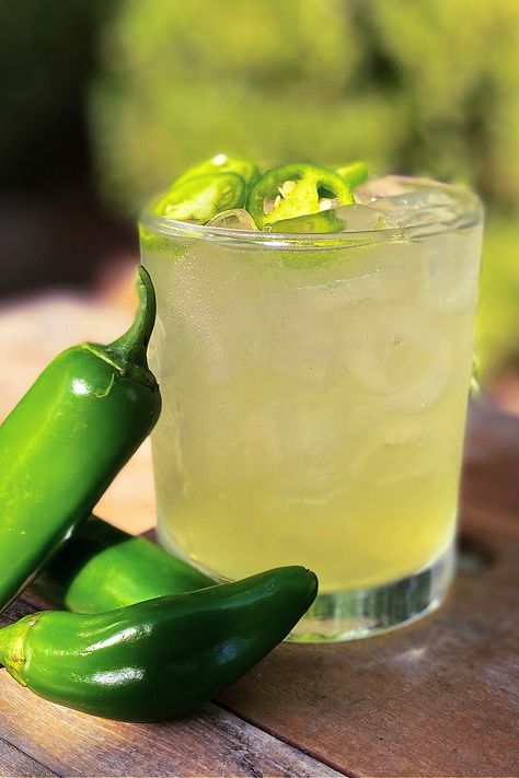 Things are sure to heat up with this jalapeño and vodka cocktail! This spicy summer cocktail combines lemon, jalapeño, bubbly water and New Deal Vodka ($24.95) for a deliciously refreshing drink on a warm day. Vodka Jalapeno Cocktail, Jalapeno Drinks Vodka, Spicy Cocktails Vodka, Cocktails With Jalapeno, Jalapeno Alcoholic Drinks, Jalepeno Vodka Recipes, Spicy Vodka Drinks, Drinks With Lemon Vodka, Spicy Vodka Cocktails