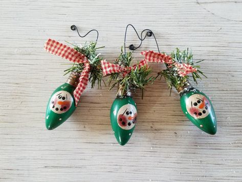 Snowman Ornament,  Primitive Snowman Ornament, Vintage Christmas Light Bulb Ornament, Primitive Snowmen, Painted Snowman, Green Fellowship Ideas, Bulb Ideas, Diy Snowman Decorations, Furniture Barn, Light Bulb Crafts, Painted Snowman, Vintage Christmas Lights, Light Bulb Ornaments, Primitive Snowman