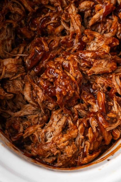 Easy Slow Cooker Pulled Pork is 3 ingredients and uses pork tenderloin for a lighter version. It's juicy, flavorful and great for sandwiches or sliders! Pulled Pork Tenderloin Slow Cooker, Pork Loin Pulled Pork, Pulled Pork Tenderloin, Easy Pulled Pork Slow Cooker, Bbq Pulled Pork Slow Cooker, Pulled Pork Recipe Slow Cooker, Crockpot Pork Roast, Pork Tenderloin Sandwich, Crock Pot Pulled Pork Recipe