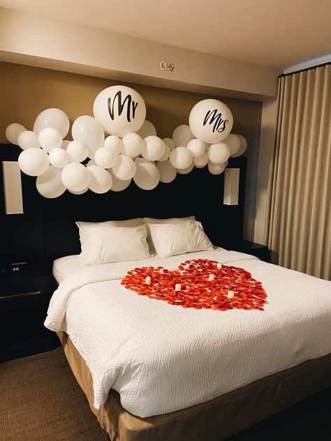 Hotel Honeymoon Decoration, Decorate Bride And Groom Hotel Room, Honeymoon Room Decor, Night Of Wedding Hotel Room, Rose Pedals On Bed, Wedding Hotel Room Decorations, Honeymoon Room Romantic, Honeymoon Hotel Room Decorations, Honeymoon Room Decorations