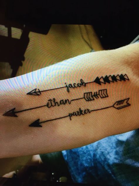 15 Arrow Tattoos That Are A Bullseye Arrow Tattoos For Women, Tattoo Arrow, Kid Name Tattoo, Boys Names, Mommy Tattoos, Sibling Tattoos, Arrow Tattoo, Arrow Tattoos, Family Tattoos