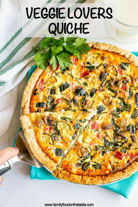 This colorful veggie quiche is loaded with a variety of veggies and cheese and baked in a pie crust for a delicious, easy breakfast or brunch. Veggie Quiche Recipes, Vegetable Quiche Recipes, Vegetarian Quiche Recipes, Brunch Quiche, Vegetarian Quiche, Veggie Quiche, Easy Breakfasts, Vegetable Quiche, Breakfast Quiche Recipes