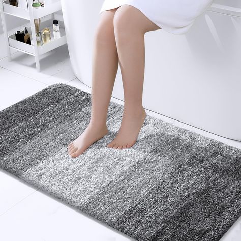 PRICES MAY VARY. [Luxuriate in Pure Comfort] Indulge your feet in the softest, coziest microfiber imaginable. With its plush pile, nearly one inch thick, our bath mat soothes and warms your feet, protecting them from the cold floor below. Enhance your bathroom decor with OLANLY's captivating bath mat. The gradient color stripe design seamlessly merges stripes, creating an eye-catching pattern that infuses sophistication into your space. [Ultra-Absorbent and Quick-Drying] Our bath mat features a Toilet Rugs, Luxury Bathroom Rug, Floor Tub, Toilet Rug, Pet Spaces, Bathroom Color, Tub And Shower, Bathroom Floor, Carpet Runner