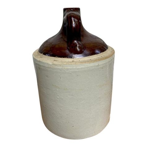 Unique home decor for antique collectors, house warming gifts or those looking to add to a vintage ambience. This listing is for a rare antique/vintage but sturdy Stoneware Jug. Two tone glaze with patina indicative of it's age, this is in great condition with no chips or cracks.  It has a few rust spots. This is a rare one of a kind find - it was found on property across from the old Egg and I farm in Wa state. "The Egg and I" was written by Betty McDonald and later made into the Ma And Pa Kett Vintage Stoneware Crocks, Rethunk Junk, Jug Decor, Antique Stoneware Crocks, Pottery Jugs, Vintage Kitchen Accessories, Antique Crocks, Vintage Glassware Antiques, Old Glass Bottles