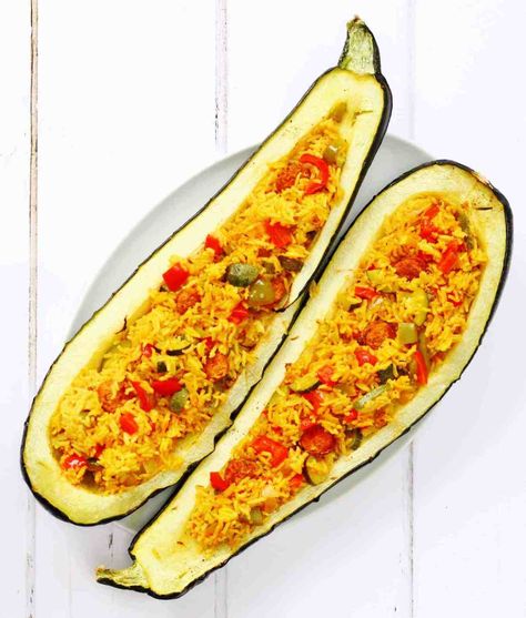 Spanish rice stuffed marrow, also known as over grown zucchini Marrow Recipes, Stuffed Marrow, Vegetable Marrow, Marrow Recipe, Veggie Board, Spanish Rice Recipe, How To Cook Chorizo, Rice Stuffing, Spanish Rice