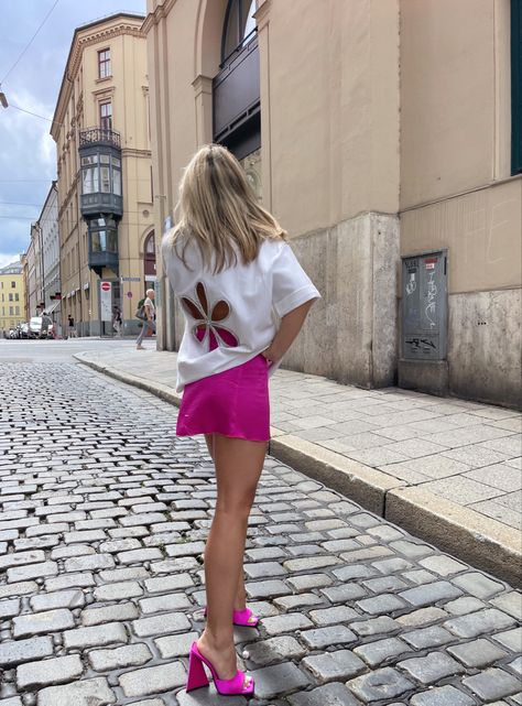 pink mini skirt, fuchsia, crystal top, streetstyle, summer, pink pumps Pink Mules Outfit Summer, The Attico Mules Outfit, Pink Silk Mini Skirt Outfit, Pink Mules Outfit, Pink Silk Skirt Outfit, Silk Mini Skirt Outfit, Pink Skirt Outfit, Pink Mini Skirt Outfit, Pink Heels Outfit