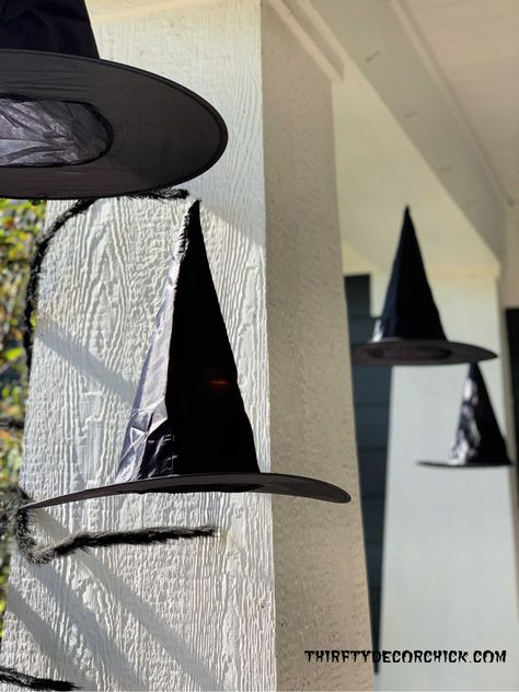 Hanging Witch Hats Porch, Halloween Decor Inside, Cheesecloth Ghost Diy, Floating Witch Hats, Mummy Candles, Floating Witch, Porch Beams, Cheesecloth Ghost, Hanging Witch