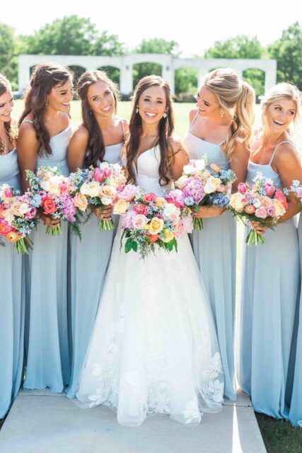 Pastel Tropical Wedding Flowers, Spring Colored Wedding Flowers, Summer Bright Wedding Flowers, Summer Simple Wedding Dresses, Dusty Blue With Bright Flowers, April Wedding Colors Bridesmaid Dress, Wedding Flowers For Blue Dresses, Blue Pink Orange Wedding Bouquet, Weddings With Colorful Flowers