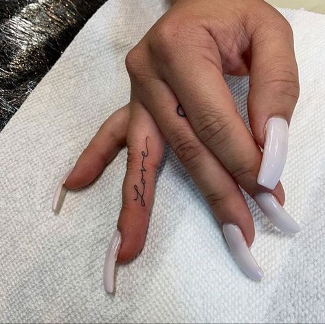 Tattos On The Side Of The Hand For Women, Cute Hand And Finger Tattoos For Women, Womens Small Finger Tattoos, Love Yourz J Cole Tattoo Finger, Finger Tattoos For Women Inside, Dainty Hand Tattoos For Women Words, Word On Finger Tattoo, Forever Finger Tattoo, Finger Tattoos Writing