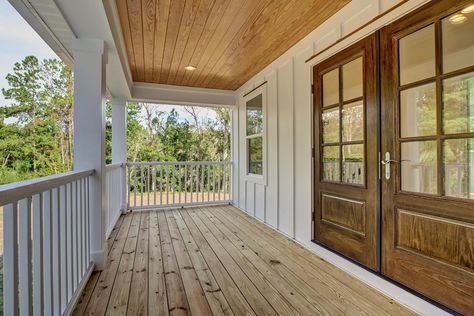 #MondayMotivation 💫Transform your outdoor space with the timeless charm of tongue and groove ceilings! 🌟 At Russell May Homes, we specialize in creating stunning porches that blend style and functionality. Our expertly crafted tongue and groove ceilings add a touch of elegance and warmth to your porch, making it the perfect place to relax and entertain. Experience the beauty and durability of quality craftsmanship with Russell May Homes. Ready to elevate your home’s exterior? Contact us tod... Tongue And Groove Ceiling Porch, Groove Ceiling, Build Dream Home, Eastern North Carolina, Tongue And Groove Ceiling, Porch Ceiling, Board And Batten Siding, Deck Designs Backyard, Deck Designs