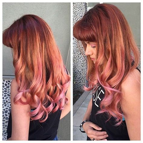 Red, peach, and pink ombré hair style.