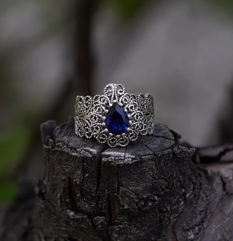 Our blue teardrop model filigree ring is hand crafted by filigree artisans and it can be adjusted to fit you. These filigrees are produced using 100% 925 sterling silver with blue sapphire gemstone. These genuine sapphire teardrop detailed dangle drop ring are admired for its delicate beauty and the intricate patterns it creates. Blue Sapphire Stone, Drop Ring, Vintage Sapphire, Delicate Beauty, Filigree Ring, Sapphire Stone, Sapphire Gemstone, Intricate Patterns, Ring Vintage