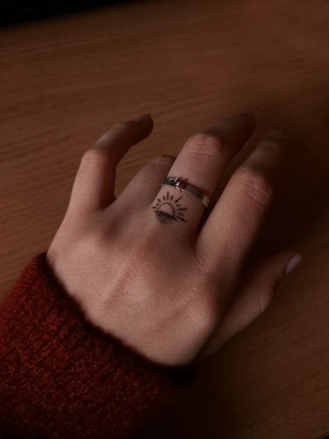 sunset tattooed finger with ring Tattoos For Him About Her, Before Sunrise Tattoo, Sunset Sunrise Tattoo, Sunrise Tattoo, Sunshine Tattoo, Song Tattoos, Sunset Tattoos, Tiny Tattoo, Side Tattoos