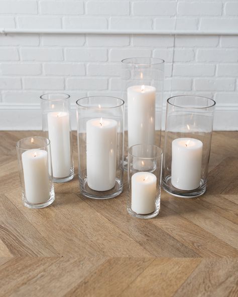 Set of 6. Features Add a little touch of romance with this set pillar candles and glass cylinder vases. Details Color Palette: Wax - whiteVase - clearQuantity:set of 12Dimensions:4x Candle 1 - 6x12in 2x Candle 2 - 6x16in 4x Candle 3 - 4x8in 2x Candle 4 - 4x12in Candles In Glass Cylinders, Floating Candles Centerpieces, Candle Lit Wedding Ceremony, Pearl Wedding Centerpieces, Candle Vases, Round Table Centerpieces, Pilar Candles, Pillar Candle Centerpieces, Blue Reception