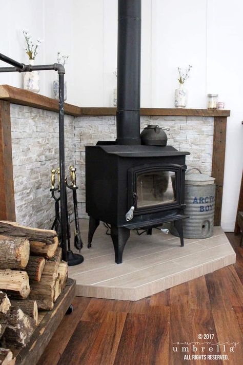 Do you desperately need a mantle update? I feel your pain! I was going through the same dilemma until I figured out how to do this easy DIY. Wood Stove Decor, Wood Burning Stove Corner, Corner Wood Stove, Wood Stove Wall, Wood Stove Surround, Diy Mantle, Corner Stove, Stove Decor, Wood Stove Hearth