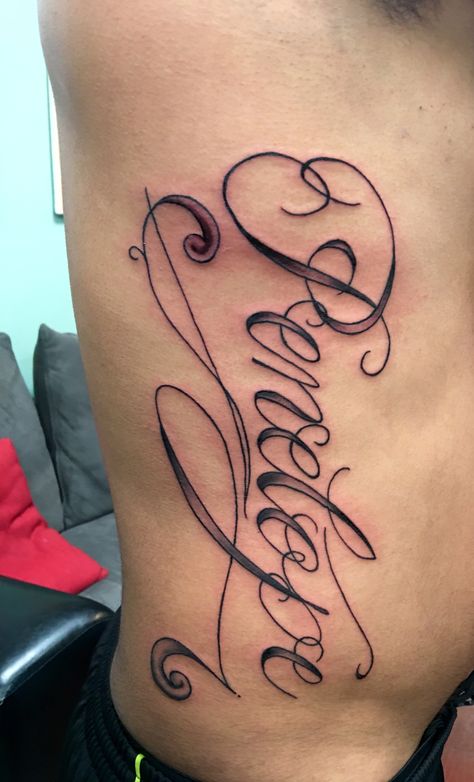 Rib cage name tattoo done at Eazy Street Tattoos located on 13433 SW 56th St Miami, FL  33175 by artist Tony #ribcage #ribcagetattoo #tattoo #big #name #letters Name Tattoos On Ribs, Name Tattoo Ribs, Big Name Tattoos, Tattoo Rib Cage, Street Tattoos, Rib Cage Tattoos, Tattoo Rib, Tattoos For Females, Baby Name Tattoos