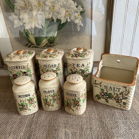 Seven pieces available, each sold separately. Pick and choose from the drop-down menu. Each is marked Made in Japan. Hand painted canisters and spice containers. Each shows signs of aging, crazing and use. Please see photos for condition issues. Prices reflect the imperfections. These are perfect for a farmhouse or rustic kitchen. Shipping cost May vary due to weight, I will refund any overage. Coffee canister - small chip on lid Tea canister - repaired lid  Sugar canister - chips on lid and bas Kitchen Storage Jars Canisters, Vintage Kitchen Supplies, Kitchen Canisters On Counter, Aesthetic Kitchenware, Painted Canisters, Vintage Kitchen Canisters, Vintage Kitchen Accessories, Apartment Needs, Cottagecore Home