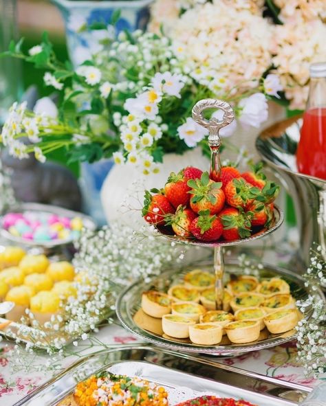 Buffet details in still photos! 🌸 More on the blog (link in profile) https://dianaelizabethblog.com/an-easter-buffet-table/ Whether it’s your Easter or garden party a sweet little umbrella over the table is a nice touch and give me all the silver! It can be vintage or everything you see here is from @potterybarn and won’t require polishing — also I think it’s on sale too! Also faux florals for the win! Tips: 🌸 My MIL taught me to put Post-its on the dishes so I know what will go there! ... Garden Party Buffet, Easter Buffet Table, Easter Buffet, Party Buffet Table, Post Its, Party Buffet, Faux Florals, Buffet Table, Garden Party