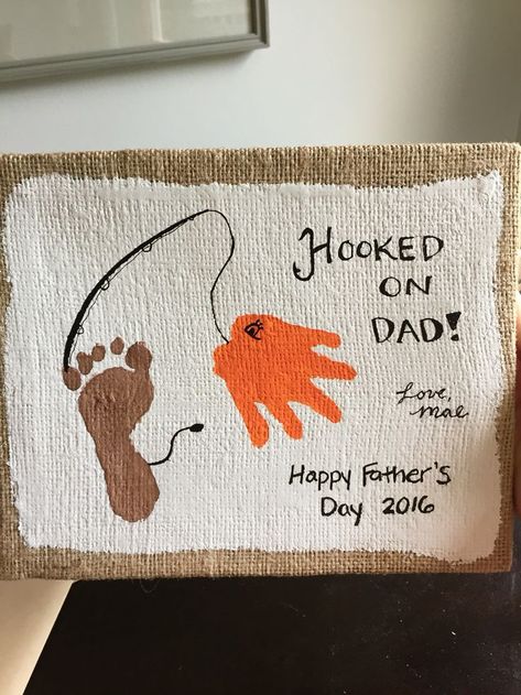 Hooked on dad Father's Day hand and footprint art.  Great keepsake for dad.  Something he'll keep forever, and a fun to make gift! Hand And Footprint Art, Diy Father's Day Crafts, Dad Crafts, Fathers Day Art, Baby Art Projects, Footprint Crafts, Diy Father's Day Gifts, Footprint Art, Handprint Crafts