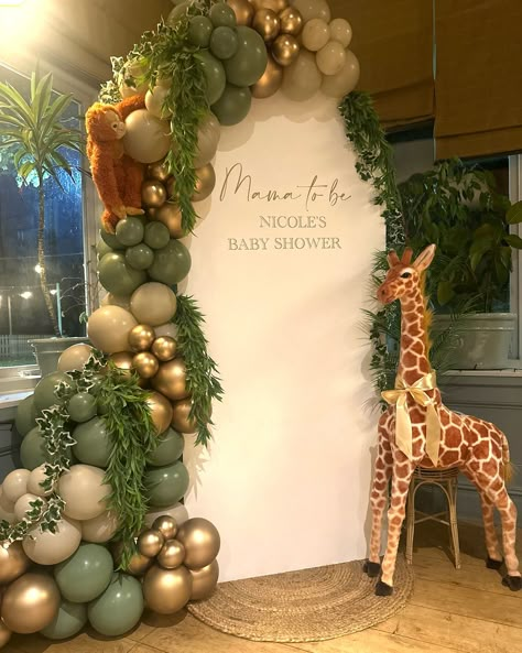 Planning a baby shower? Want beautiful balloon decor for that Mamma to be? You are absolutely in the right place! #luxurysafari #luxuryballoons #modernbabyshower #sagegreenballoons #sageandgold #balloongarland #safarilux #elegantbabyshower #botanicalballoons #organicdesign #balloonartistry #safarichic #greenandgoldballoons #partyplanning #babyshowergoals #babyshowerideas #safaribabyshower #safaribabyshowertheme #safariballoons Safari Baby Shower Balloon Arch, Safari Baby Shower Gender Neutral, Wild One Baby Shower Theme Boy, Born To Be Wild Baby Shower Ideas, Zoo Animal Baby Shower Ideas, Zoo Themed Baby Shower Ideas, Baby Shower Jungle Theme Boy, Animal Theme Baby Shower Ideas, Baby Shower Themes Safari