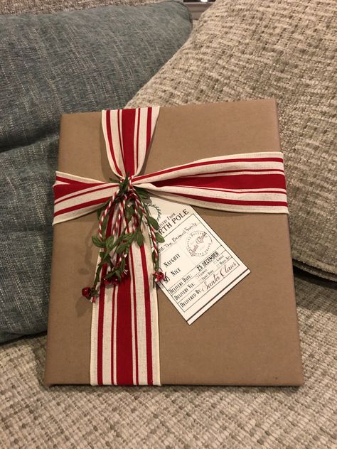 From Santa Wrapping Ideas, Wrapping From Santa, Christmas Ribbon Wrapping Ideas, Red And Green Christmas Gift Wrapping, Plaid Christmas Gift Wrapping Ideas, Santa Wrapped Presents, Fake Wrapped Presents, Presents From Santa Wrapping, Gifts From Santa Wrapping