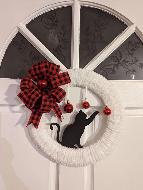 Dollar Tree Fanatics Crafts & Decor | Dollar tree round wreath form, ribbons, red ornaments, and tongue depressor to support foam the cat .... | Facebook Christmas Cat Wreaths For Front Door, 3d Wreath Form Ball Ideas, Cat Wreaths For Front Door Diy, Cat Christmas Wreath Diy, Gnome Wreath Diy, Crochet Wreaths, Tongue Depressor, Cat Wreath, Porch Wreath