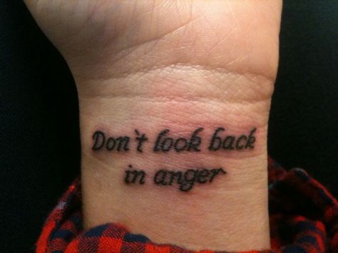 Text tattoo - "dont look back in anger" Anger Issues Tattoo, Believe Wrist Tattoo, Faith Wrist Tattoo, Love Wrist Tattoo, Don't Look Back In Anger, Wrist Tattoos Words, Meaningful Wrist Tattoos, Places For Tattoos, Lakewood Colorado