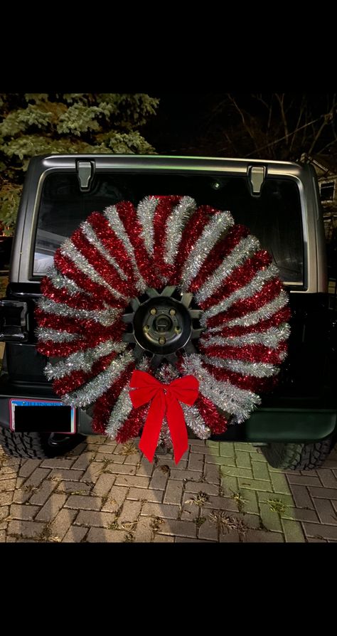 Jeep Xmas Decorations, Jeep Wrangler Christmas Wreath, Jeep Decorated For Christmas, Jeep Wrangler Holiday Decorations, Christmas Decor For Jeep, Jeep Tire Christmas Decorations, Thanksgiving Jeep Decorations, Jeep Spare Tire Christmas Wreath, Decorating Jeep For Christmas