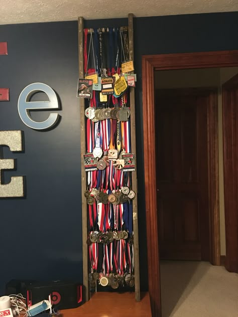 Medal display on an old ladder Display Medals, Race Medal Displays, Sports Medal Display, Running Medal Display, Trophy Display, Ribbon Display, Running Medals, Old Ladder, Sports Medals