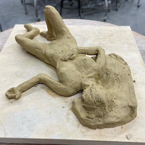 A unfired clay figure sculpture in a relaxed laying position. Laying Pose, Arts Project, Portfolio Theme, Figure Sculpture, Clay Figures, Art Portfolio, Art Projects, Portfolio, Sculpture