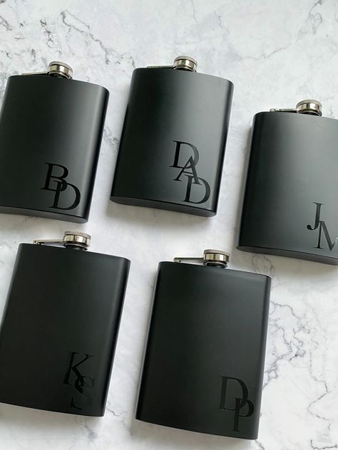 Our personalized stainless steel hip flask is the perfect gift to tuck into your proposal bags or boxes for the bridal party! Your groomsmen and bridesmaids are sure to love their completely personalized flasks! It's stainless steel and holds 8 ounces. Choose from various font colours and styles for either your bridesmaids or groomsmen! *due to shipping costs, please note a minimum of 3 per order. Orders with less than 3 selected for your quantity will unfortunately be cancelled* YOU MAY ALSO LIKE: METAL BOTTLE OPENER GROOMSMEN GIFTS: https://www.etsy.com/ca/listing/1354614046/personalized-bottle-opener-gift-for?click_key=2667cc8b66c43a6d9785d0487d7524390fa1da52%3A1354614046&click_sum=033462ea&ga_search_query=BOTTLE&ref=shop_items_search_1&pro=1&frs=1 PERSONALIZED GIFT BAGS: https://www.et Personalized Flask, Groomsman Proposal Box, Groomsmen Proposal Gifts, Groomsmen Flask, Bridesmaid Groomsmen Gifts, Weddings Idea, Bachelor Gifts, Bachelor Party Gifts, Wedding Gifts For Groomsmen