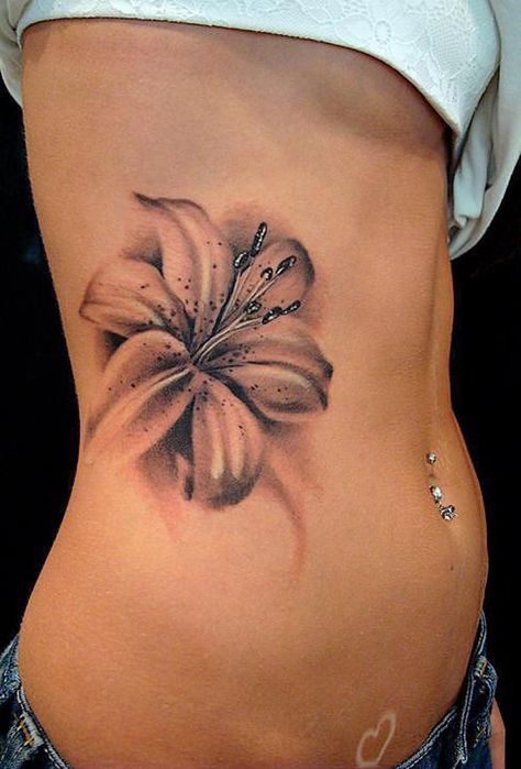 Single lily flower. I'd have it smaller, near my hip bone. 3d Flower Tattoos, Tattoo Lily, Girl Rib Tattoos, Tiger Lily Tattoos, Rosen Tattoo Frau, Realistic Flower Tattoo, Flower Tattoo On Side, Lily Flower Tattoos, Hibiscus Tattoo