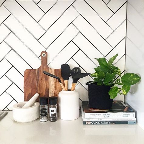 Herringbone Tiles Kitchen, Style Curator, White Herringbone Tile, White Kitchen Splashback, Herringbone Kitchen, Kitchen Splashback Tiles, Kitchen Vignettes, Black Grout, Tile Splashback