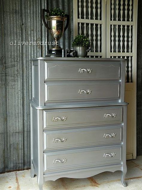 Metallic silver paint has a rich luster that looks expensive. Here are tutorials for shiny and aged silver paint looks. Painted furniture always looks great and I love these painted furniture ideas using silver paint. Not every shiny silver piece may fit in your home, but a beautifully aged piece might. See more on the blog for details. http://decoratedlife.com/how-to-paint-furniture-metallic-silver-paint-looks/?hvid=4mtQd0 The look is almost stainless steel. For the best result, prep, prep ... Rust Furniture, Silver Painted Furniture, French Provincial Dresser Makeover, Metallic Painted Furniture, Silver Dresser, French Provincial Dresser, Silver Furniture, Shabby Chic Dresser, Furniture Rehab