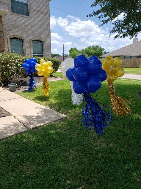 Blue And Yellow Backdrop Ideas, Blue White Graduation Party Ideas, Blue White And Gold Graduation Party, Blue And Gold Graduation Centerpieces, Royal Blue And Gold Graduation Party, Graduation Party Ideas Aesthetic Blue, Blue And Gold Graduation Party Decor, Blue And Gold Grad Party, Blue And White Graduation Party Ideas