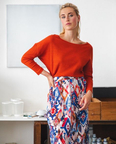 Introducing the Pia Pull Brick: A stylish and comfortable must-have for your wardrobe! With long sleeves, a boat neckline, lowered shoulder lines and terracotta rib cotton, it's a modern classic.⁠ ⁠ Complete the look by pairing it with our skirts in Ikat print. 🧡⁠ ⁠ #moncol #adaptyourstyle #slowfashion #sustainablefashion #fairfashion #fewerbetter #ethicalfashion #consciousfashion #ecofriendlyfashion #sustainablestyle #sustainableclothing #slowfashionstyle #ikkoopbelgisch #ss24 #newcollection Ikat Print, Skirt And Blouse, Conscious Fashion, Boat Neckline, Sustainable Clothing, Ethical Fashion, Summer Essentials, Wrap Skirt, Skirt Pants