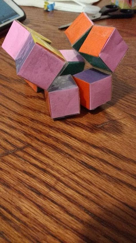 How to Make an Infinity Cube Out of Paper (with Pictures) Infinity Cube, Paper Making, Construction Paper, The Infinity, Paper Tape, Origami Paper, Fidget Toys, Craft Tools, Paper Box