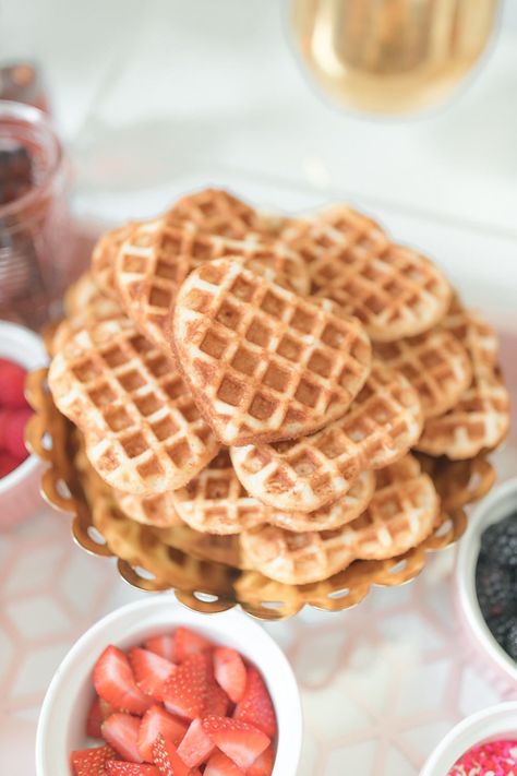 Blogger Stephanie Ziajka shares a handful of fun Galentine's Day brunch ideas (including a Galentine's Day brunch menu, heart-shaped waffle bar ideas, and budget-friendly Galentine's Day decor ideas) in today's post on Diary of a Debutante. Click through for the full Galentine's brunch spread! #galentinesday #brunch #wafflebar #waffles #galentines #brunchrecipes Waffle Bar Ideas, Heart Shaped Waffles, No Bake Truffles, Waffle Bar, Brunch Spread, Truffle Recipe, Valentine's Day Recipes, Brunch Menu, Rice Krispie Treats