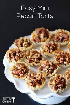 Easy Mini Pecan Tarts | gimmesomeoven.com Mini Pecan Tarts, Phyllo Tart, Mini Ovens, Pecan Tarts Mini, Tart Shells Recipe, Mini Dessert Easy, Pecan Tarts Recipe, Pecan Bites, Mini Tart Shells