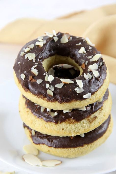 These Chocolate Glazed Almond Donuts are baked to perfect and topped with chocolate and almonds! They bake up in just about 10 minutes! | The Bitter Side of Sweet Lemon Cheesecake Tarts, Pasta Primavera Salad, Ham Egg Cups, French Coconut Pie, Potted Shrimp, Caramel Apple Cake, Cinnamon Twists, Sour Cream Pound Cake, Biscuit Sandwich